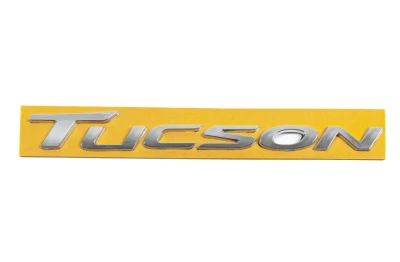 Emblemat z napisem "Tucson" do Hyundai Tucson TL 2016-2021, 220×22 mm, AVTM, 6457174A