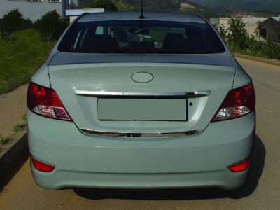 Chromowana listwa klapy bagażnika (stal nierdzewna) Hyundai Accent 2011-2017, Carmos, 64599209