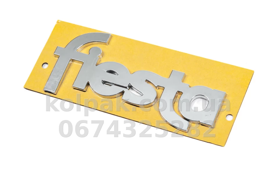 Emblemat z napisem "Fiesta" do Ford Fiesta 1995-2001. 117×52 mm, AVTM, 6458401C Emblemat z napisem "Fiesta" do Ford Fiesta 1995-2001. 117×52 mm, AVTM, 6458401C — zdjęcie 1